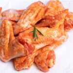 A flavorful dish of chicken with masala, showcasing aromatic spices and rich colors, highlighting quality ingredients from The National Halal Meat"