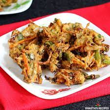 Crispy chicken pakoras served in a square dish, showcasing flavorful bites that highlight quality and taste from The National Halal Meat
