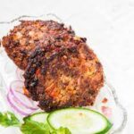 Crispy chicken pakoras served in a square dish, showcasing flavorful bites that highlight quality and taste from The National Halal Meat
