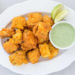 A delicious fish pakora recipe showcasing crispy fried fish bites, highlighting flavors and cooking techniques from The National Halal Meat